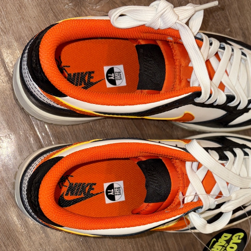 Nike Black and Orange Glow Sneakers - Picture 5 of 10